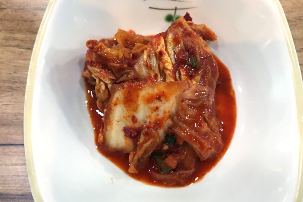A plate with traditional Korean kimchi – made of cabbages seasoned with spices – is seen on a table of a restaurant in Seoul. Photo: Reuters