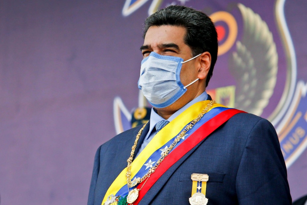 Venezuela's President Nicolas Maduro wearing a face mask at a ceremony in Maracay, Aragua state, Venezuela on Friday. Photo: Venezuelan presidency via AFP