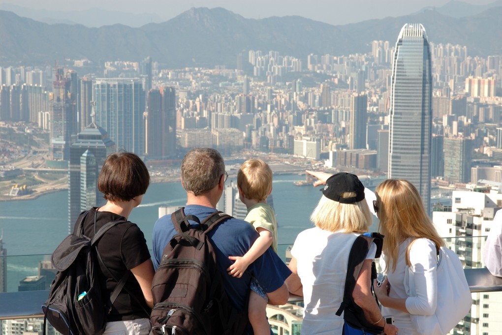 A family look at the Hong Kong skyline. Photo: Shutterstock