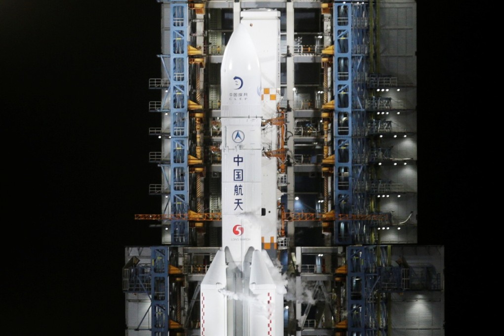 The Chang’e 5 lunar probe, carried by a Long March rocket, before take-off on its way to the moon. Photo: Reuters