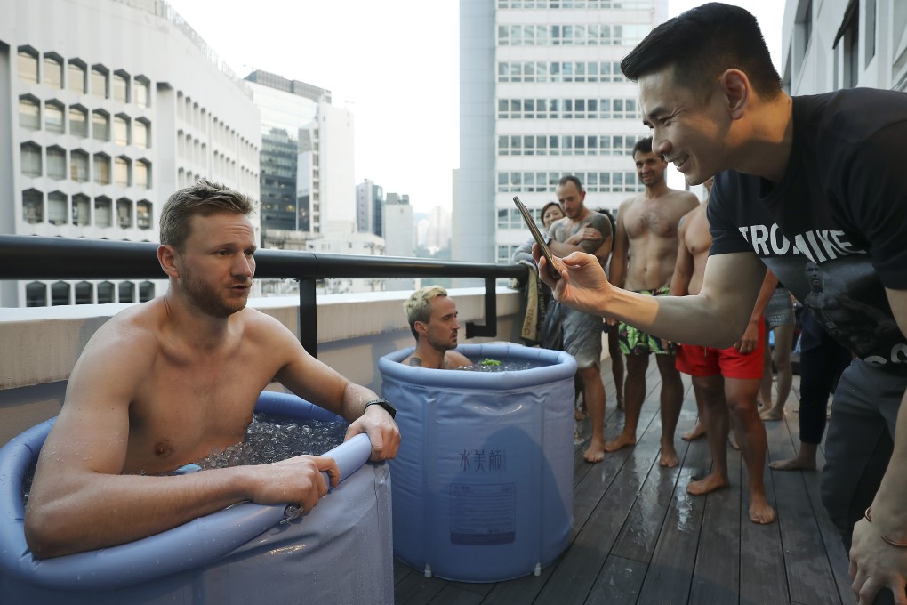 SCMP reporter Mark Agnew learning the breathing technique to control the body’s response to the cold from Brian Lai, Hong Kong’s first and only certified Wim Hof Method Instructor. Photo: Xiaomei Chen