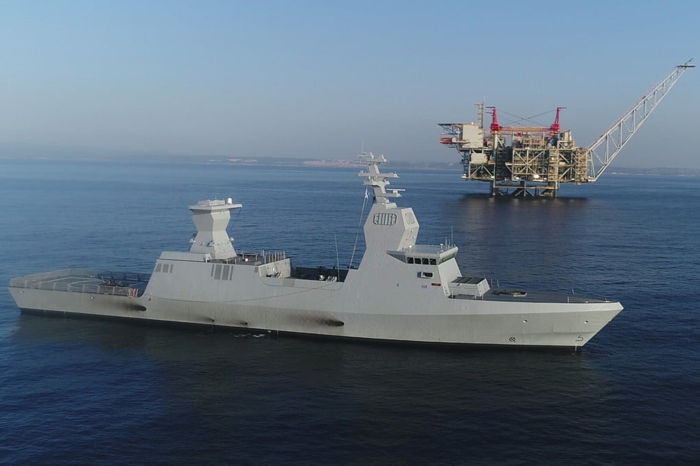 Israel’s new Saar-6 corvette cruises near a natural gas production platform in the Mediterranean Sea off the coast of Haifa on Tuesday. Photo: Reuters