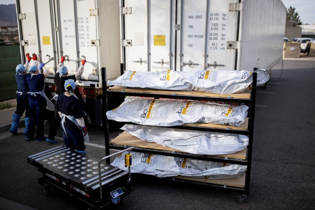 El Paso County Medical Examiner's Office staff lock-up mobile morgues before moving bodies in El Paso, Texas. Photo: Reuters