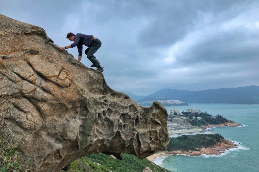 Andrew Daniels on Rhino Rock in Stanley, one of 160 trails as he attempts to hike every route in Hong Kong. Photos: Handout