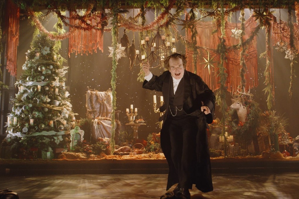 Tony Award-winner Jefferson Mays performs during a one-man A Christmas Carol Live that is being filmed for streaming this month at the empty 3,000-seat United Palace on Broadway. The one-man show is an example of how many who work in theatre are increasingly defying Covid-19. Photo: Courtesy of A Christmas Carol Live/AP