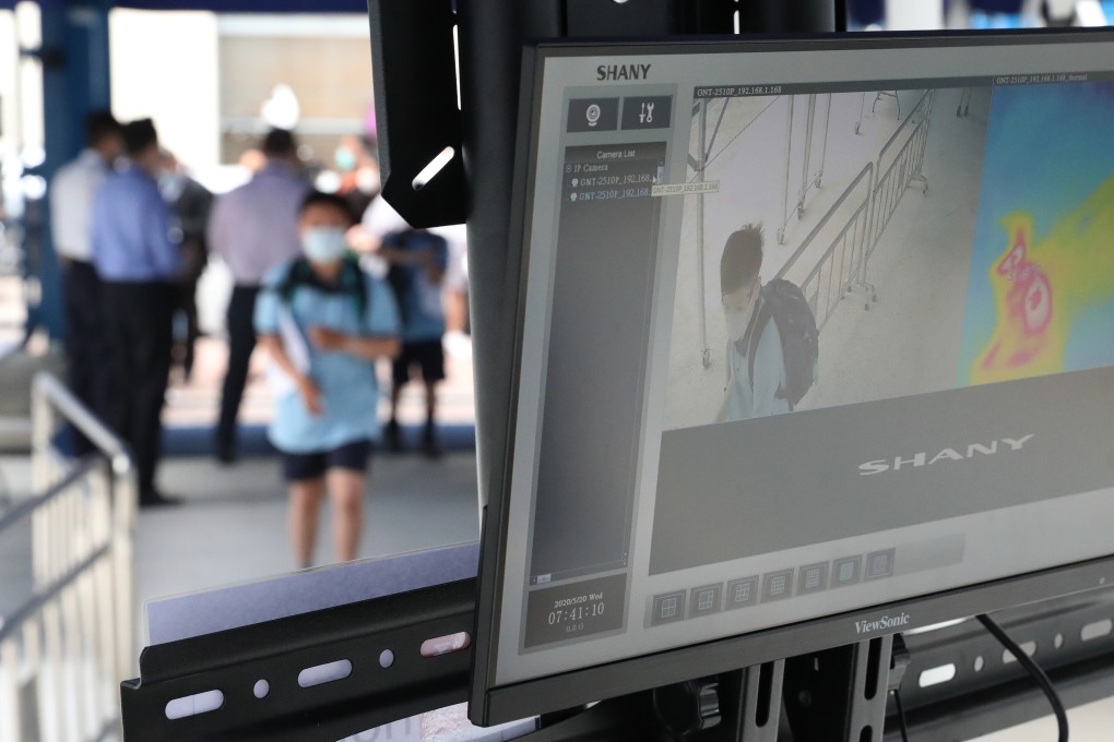 Pupils’ temperatures are checked via camera as they enter a school in Tai Kok Tsui on May 20. Photo: Nora Tam