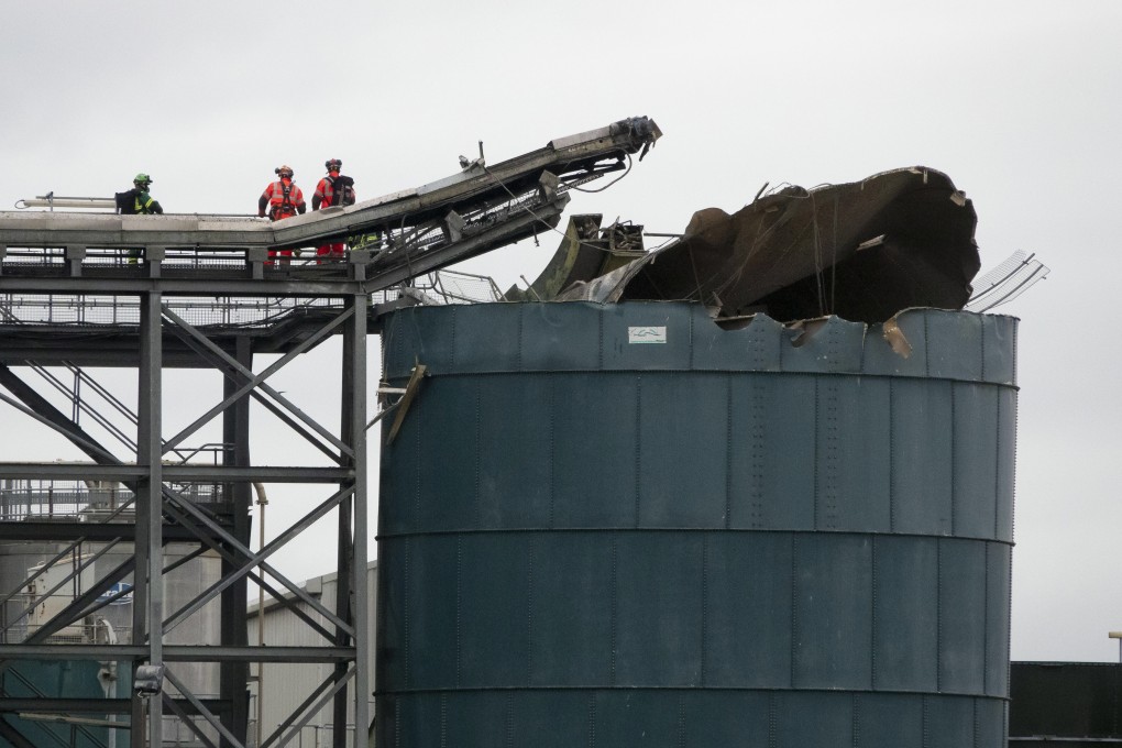 Emergency workers are seen at the site of the explosion in Avonmouth, Bristol on Thursday. Photo: EPA-EFE