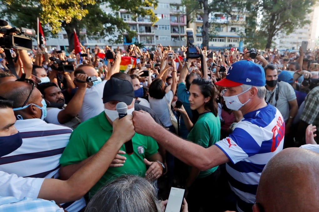 Cuban President Miguel Diaz-Canel, right, attends a concert in Havana organized by youth organizations to condemn the media campaign in support of the San Isidro movement, on November 29. Photo: EPA-EFE