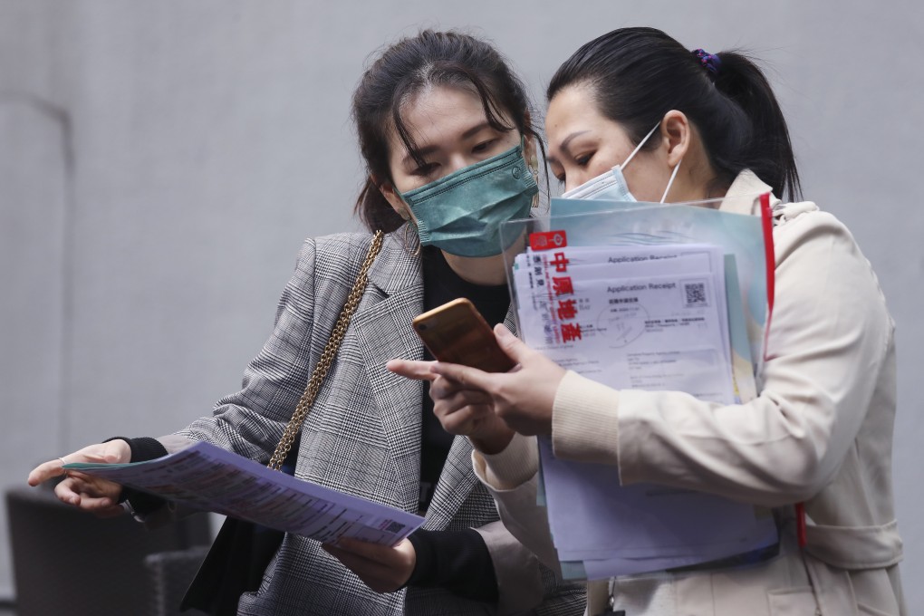 Potential homebuyers line up at MinMetals Land’s sale office at One Pacific Centre in Kwun Tong for the Montego Bay project on 5 December 2020. Photo: Xiaomei Chen