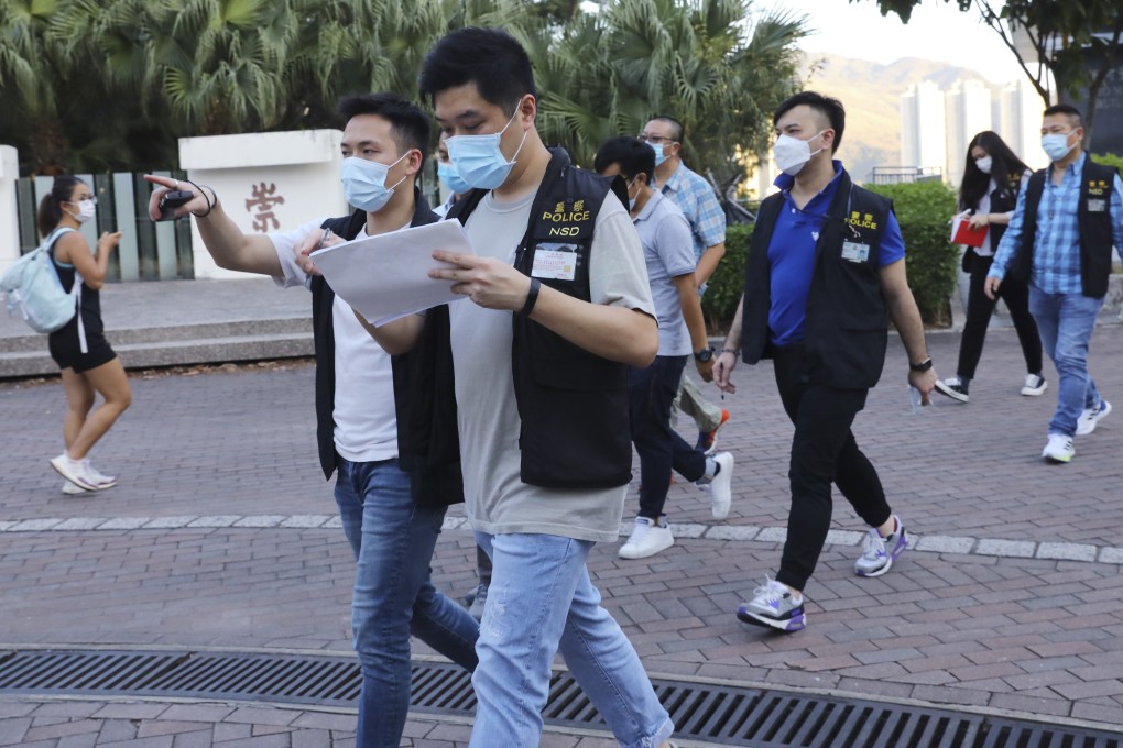 Officers from the police national security department carry out an investigation after the rally at Chinese University last month. Photo: Dickson Lee