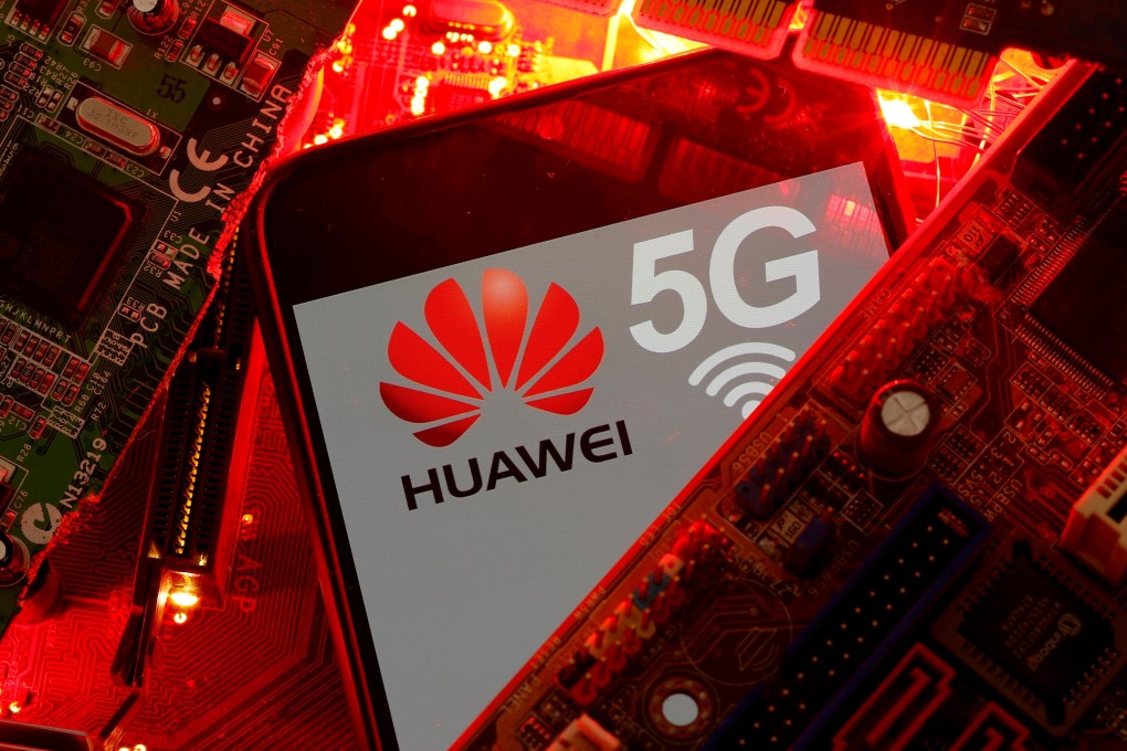 A smartphone with the Huawei and 5G network logo is seen on a PC motherboard in this illustration picture taken January 29, 2020. Photo: Reuters