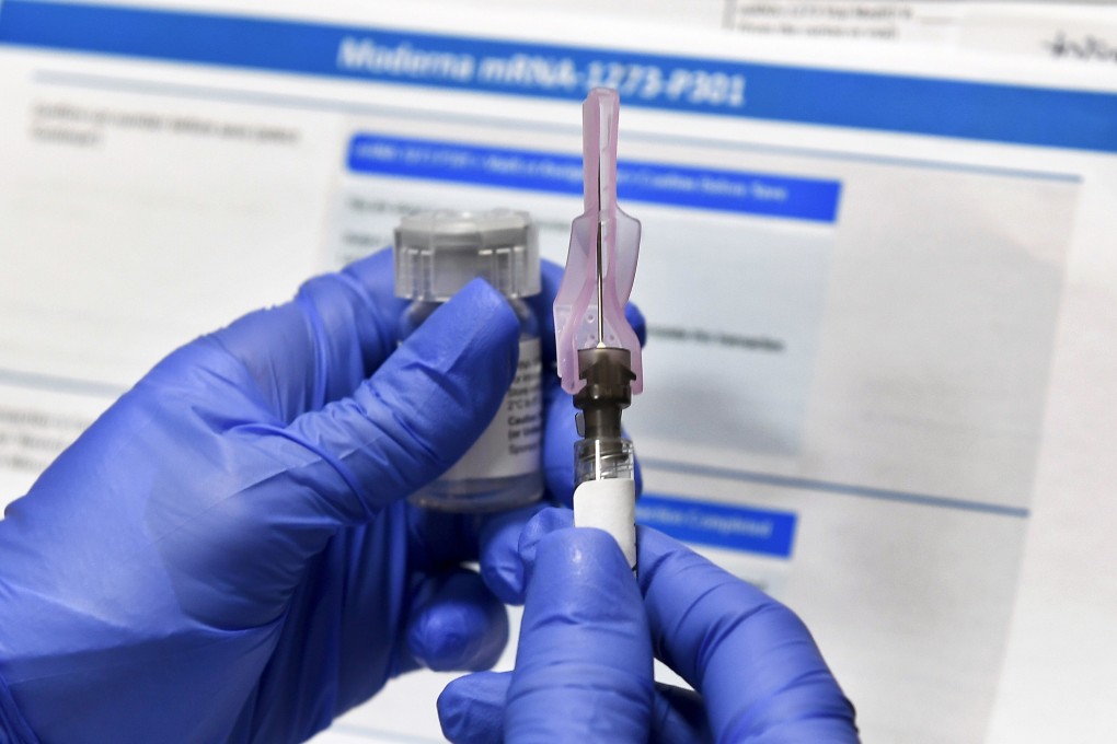 A nurse prepares a syringe and a vial of the Moderna Covid-19 vaccine in New York in July. Photo: AP