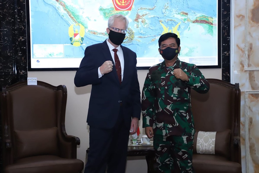Acting US Defence Secretary Christopher Miller, left, With Indonesian Air Chief Marshal Hadi Tjahjanto in Jakarta on Monday. Photo: AFP