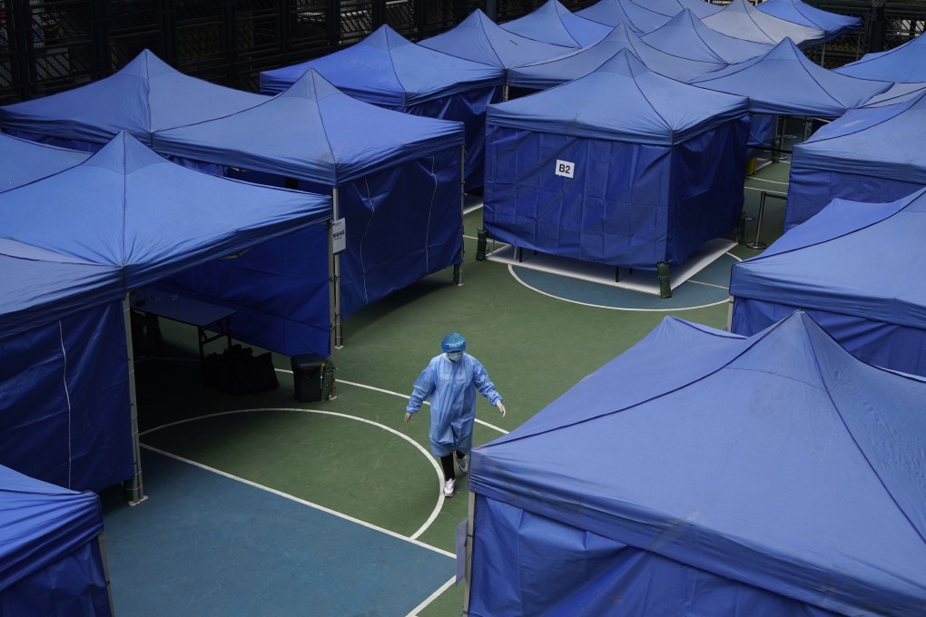 A medical worker in a protective suit at a coronavirus testing centre in Hong Kong on December 8, as the city confronts an alarmingly worsening fourth wave of the Covid-19 pandemic. Photo: AP