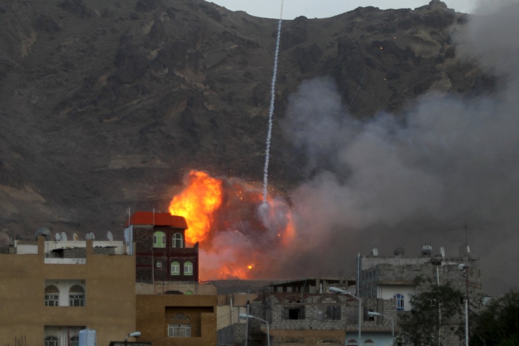 Smoke billows from an army weapons depot after it was hit by an air strike in Yemen’s capital Sanaa in 2015. Photo: Reuters