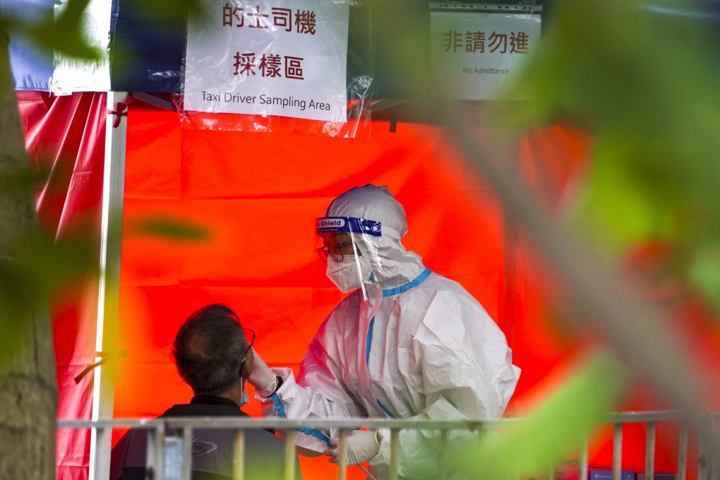Medical workers take samples from taxi drivers for Covid-19 testing at Kwun Tong Public Pier. Photo: Felix Wong