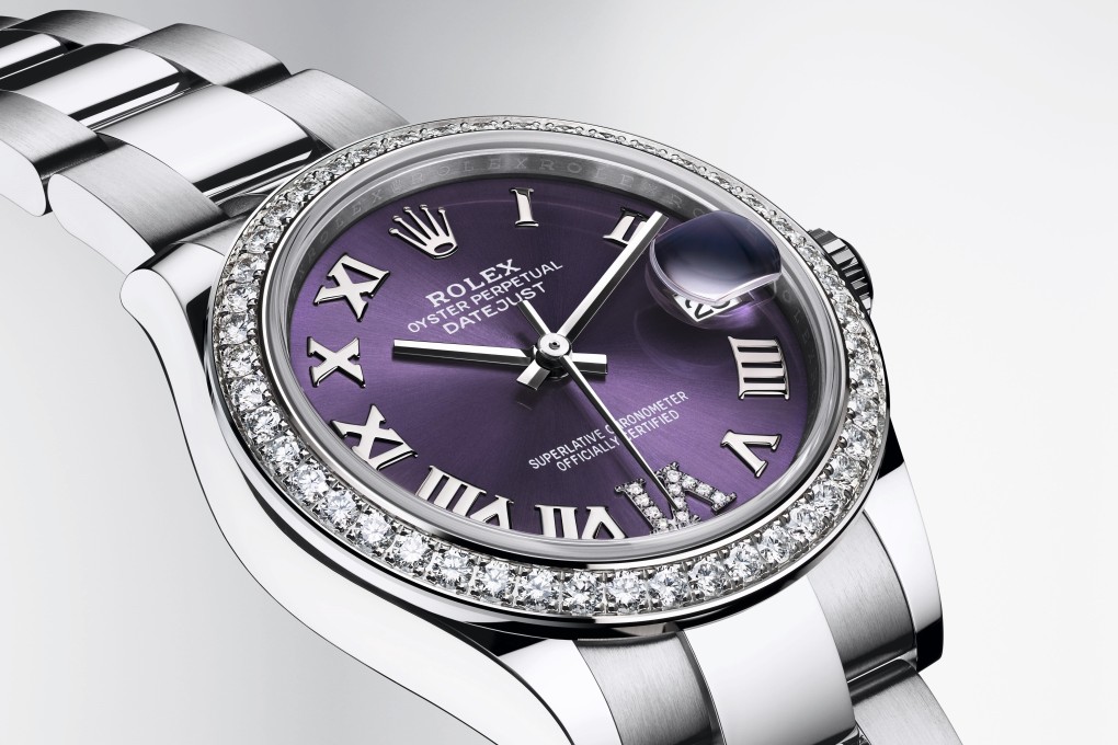 The Rolex Oyster Perpetual Datejust 31 with a bezel set with 46 brilliant-cut diamonds and an aubergine, sunray-finish dial with a diamond-set VI. Photo: Handout