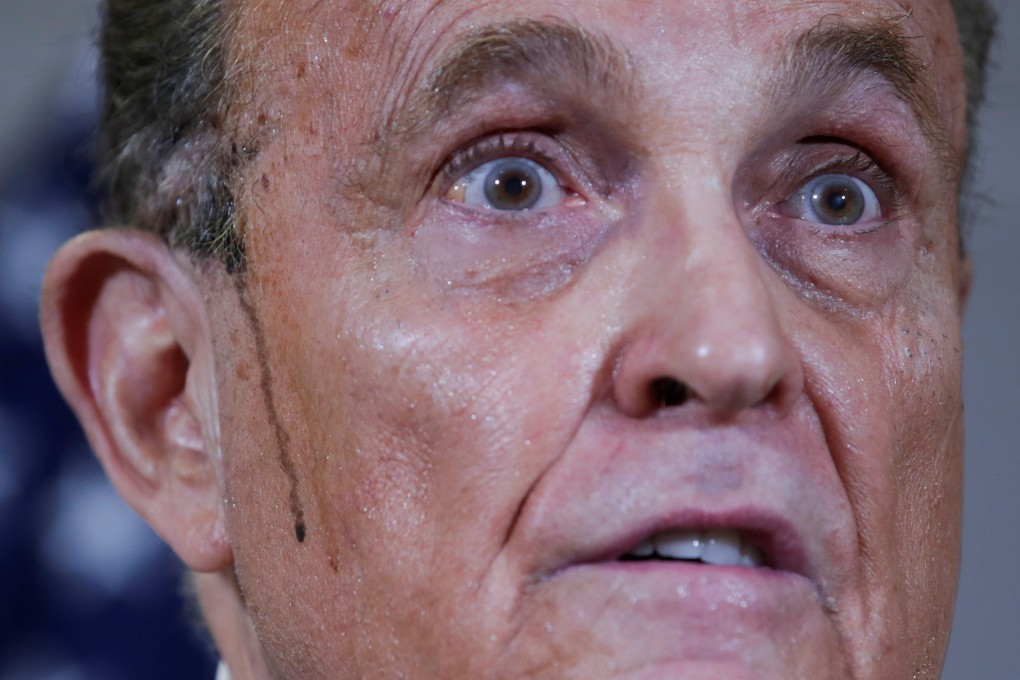 Sweat runs down Rudy Giuliani’s face at a news conference in November. File photo: Reuters