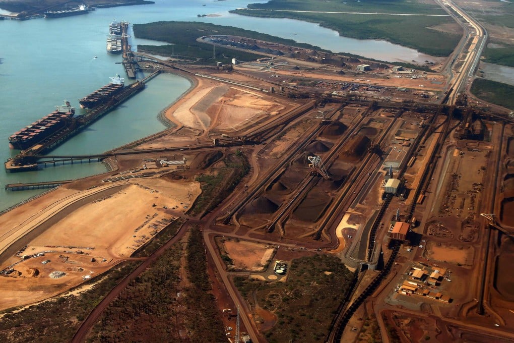 Ships wait to be loaded with iron ore at Port Hedland in the Pilbara region of Western Australia. Photo: Reuters