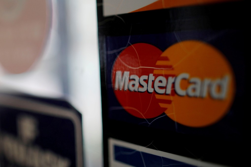 A MasterCard sticker is displayed at a store in Cambridge, Massachusetts. Photo: Reuters