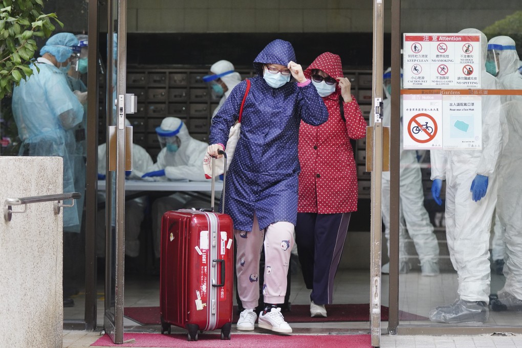 Residents leave Block 6 of Richland Gardens in Kowloon Bay. Photo: Sam Tsang