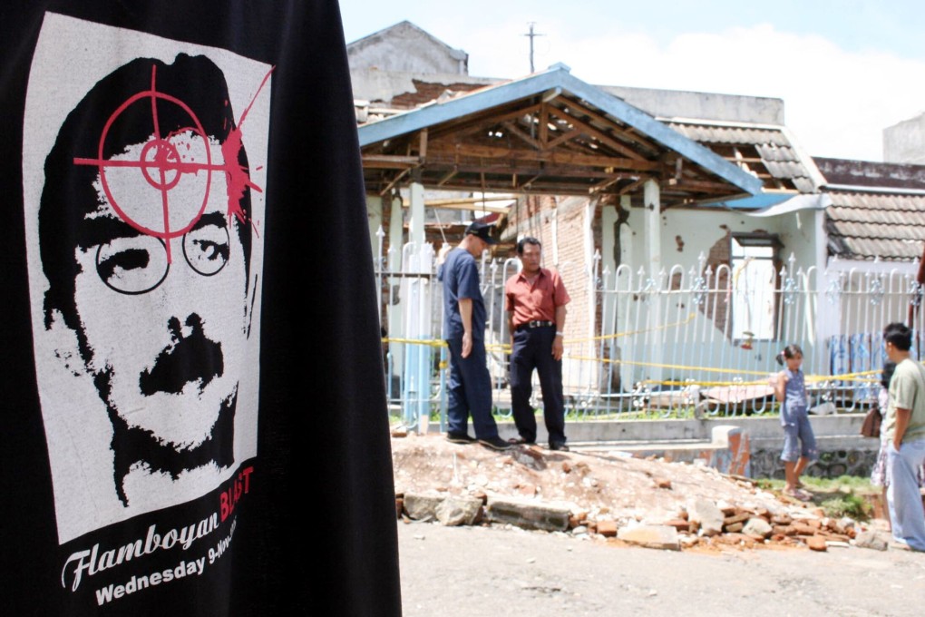 The house where Azahari Hussein, one of Asia's most-wanted terrorists, spent his last hours, alongside a T-shirt for sale bearing Azahari’s likeness, in Batu, Indonesia in 2005. Azahari taught his bomb-making skills to Upik Lawanga, who was arrested by Indonesian police two weeks ago. Photo: AFP