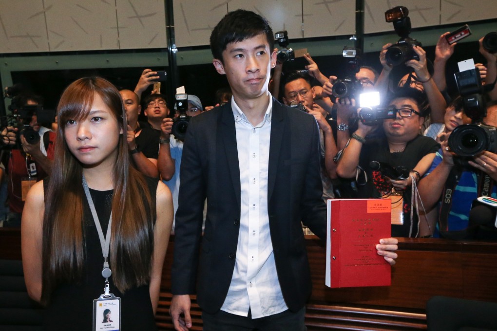 Former lawmaker Sixtus Baggio Leung (centre) has left Hong Kong and is seeking asylum in the US. Photo: Sam Tsang