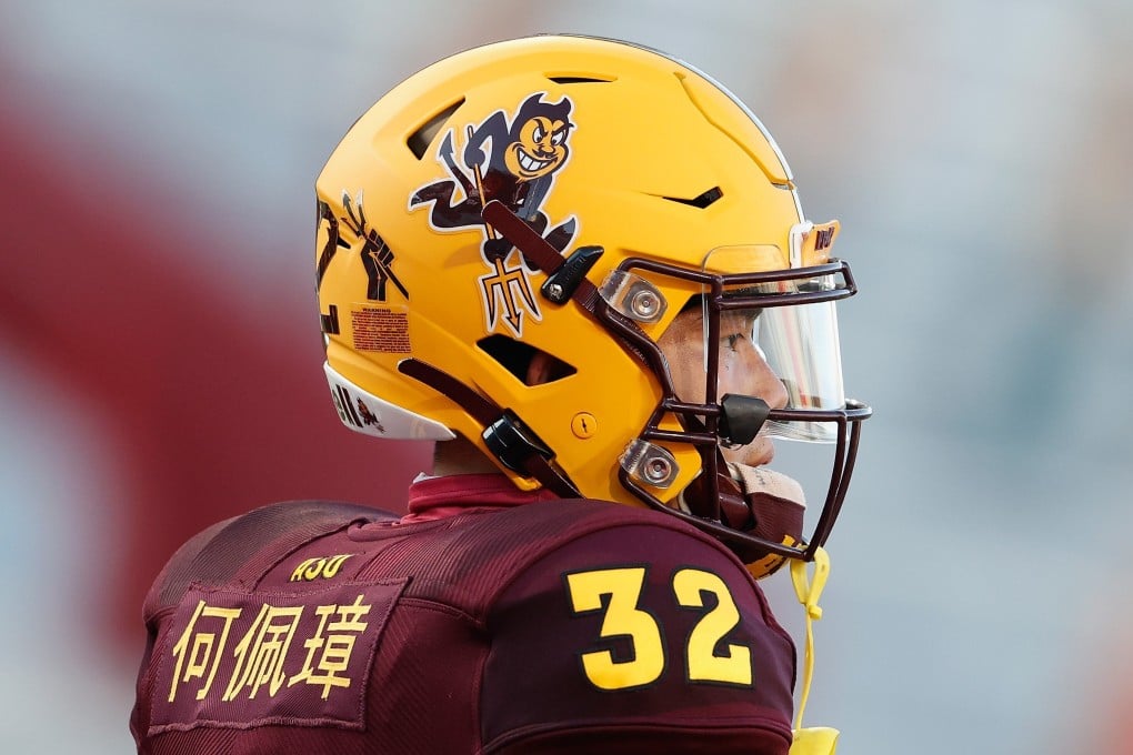 Running back Jackson He of the Arizona State Sun Devils warms up before the NCAA game against the Arizona Wildcats at Arizona Stadium. Photo: AFP
