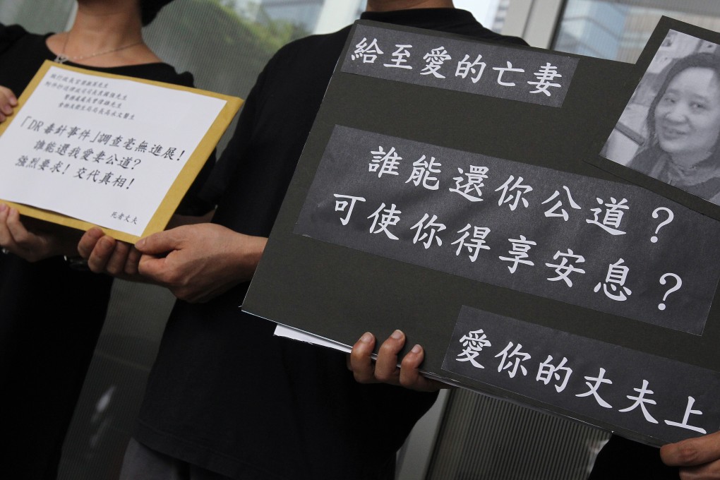 Family members of a woman who died after undergoing a procedure at DR Group’s Hong Kong Mesotherapy Centre protest outside the Legislative Council, urging the government to conduct a thorough investigation, in October 2013. Photo: K.Y. Cheng