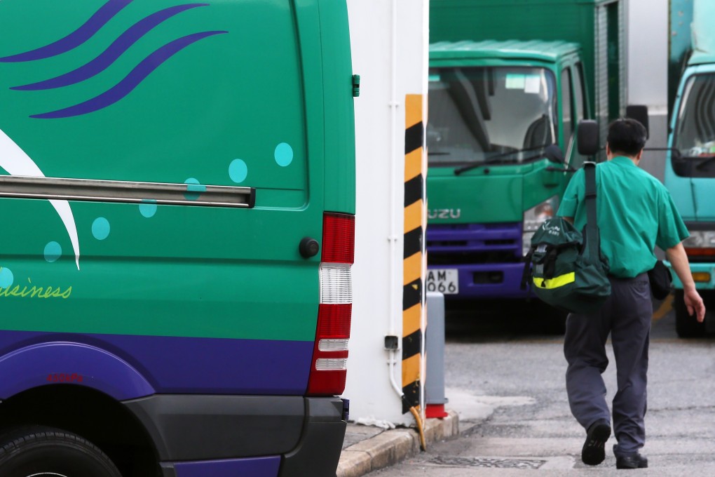 A postman at the General Post Office, at Connaught Place in Central. Photo: K. Y. Cheng