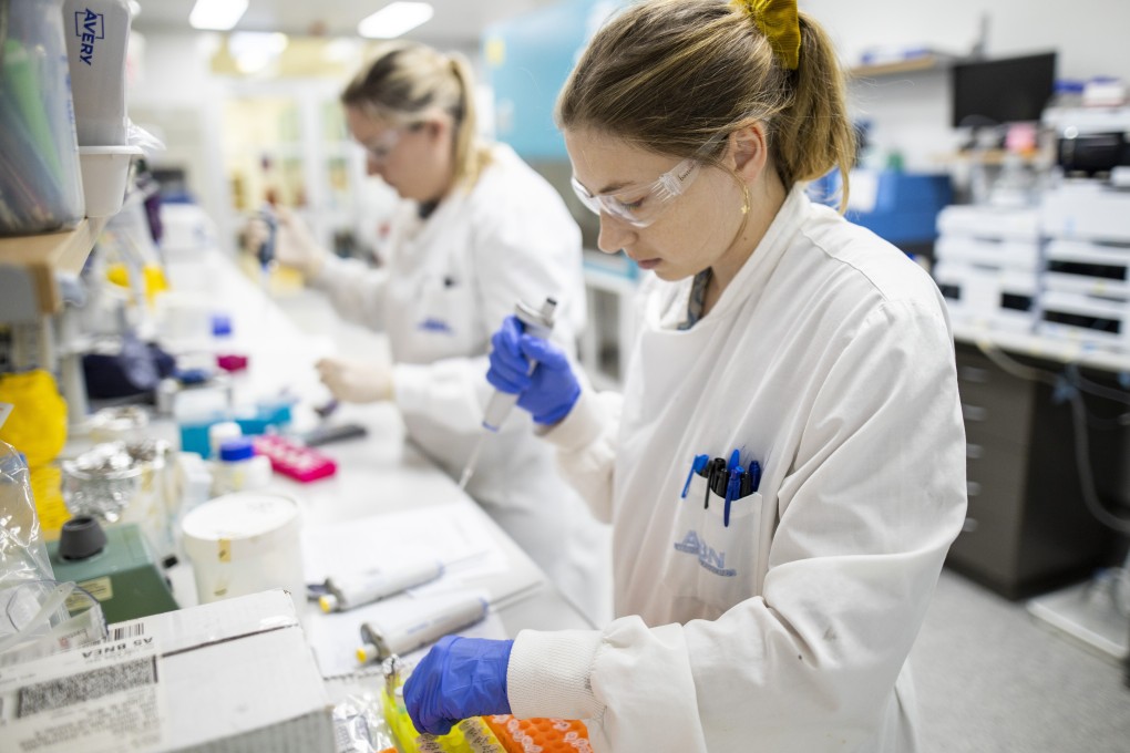 Researchers work at a laboratory at the University of Queensland (UQ) in Brisbane, Australia. The coronavirus vaccine being developed with local biotech firm CSL will not progress to Phase 2/3 trials. Photo: Xinhua