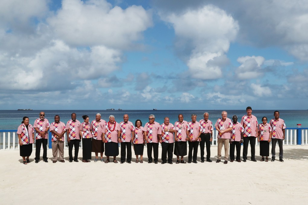 Australia’s Prime Minister Scott Morrison (fifth from right) poses for a group photo with other leaders on the sidelines of the Pacific Islands Forum in Tuvalu on August 15, 2019. Photo: AFP/Australian Prime Minister’s Office