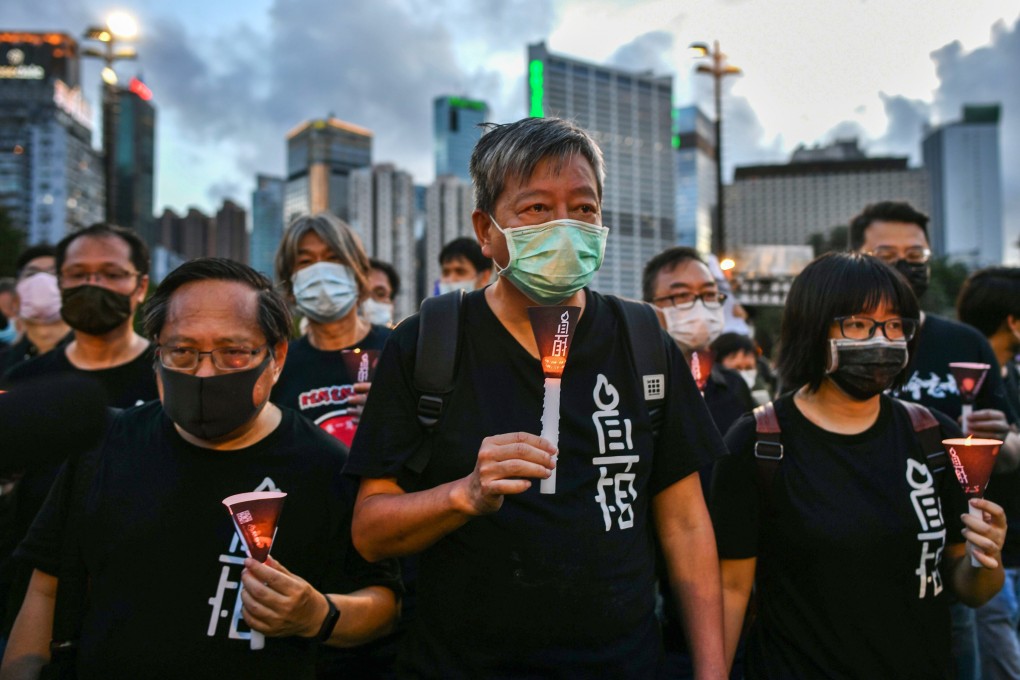 Activist Lee Cheuk-yan (centre) says supporters of the alliance he leads now prefer the anonymity of donating in cash. Photo: AFP