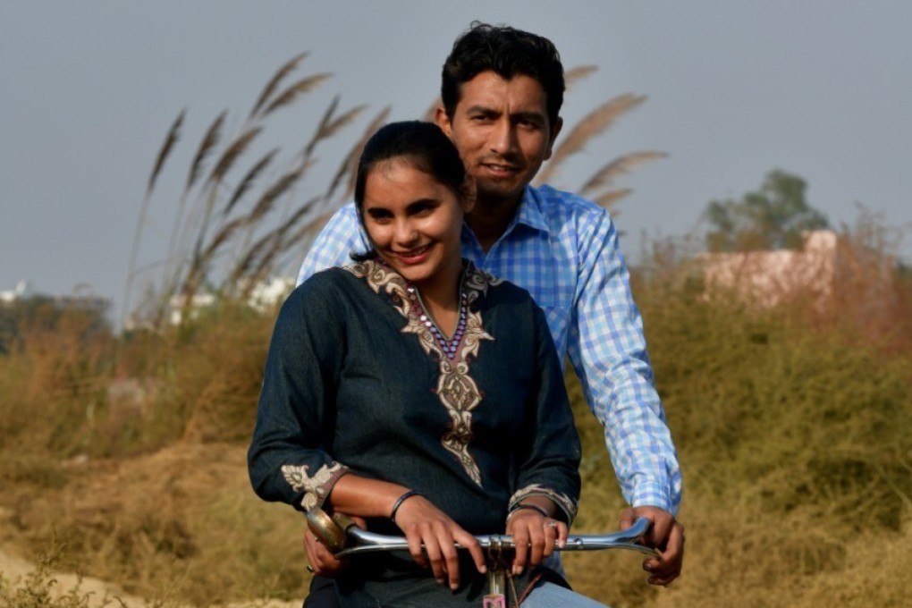 Mohit Nagar, a Hindu, with his wife Amreen Malik, a Muslim, in India. The couple eloped to Delhi in March so they could get married, against their families’ wishes. Photo: Courtesy of Mohit Nagar
