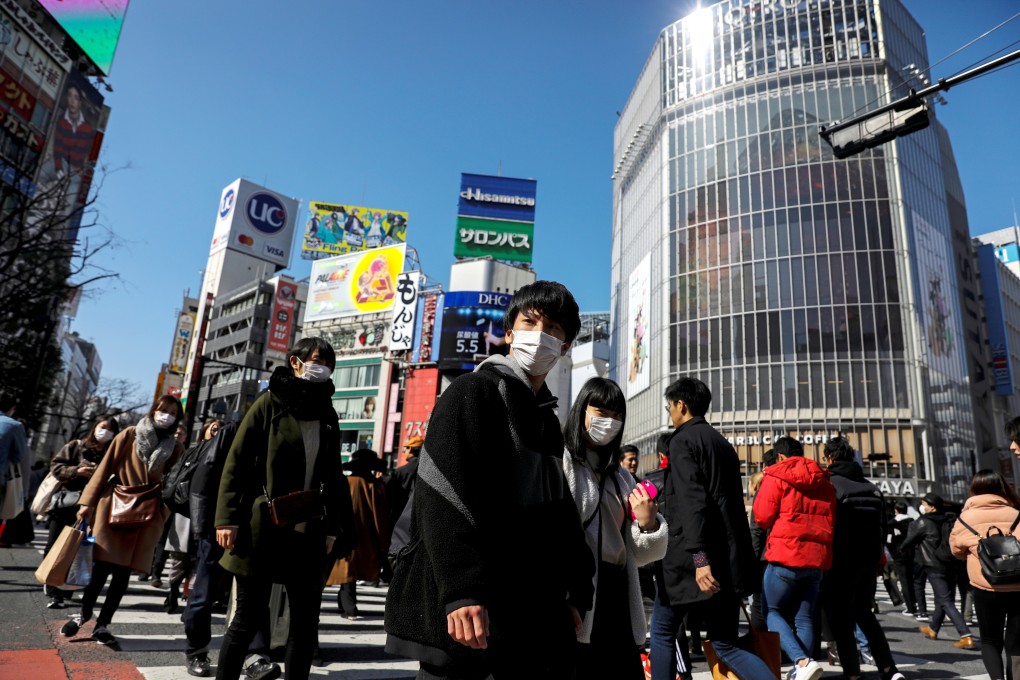 Pedestrians in the Shibuya shopping district in Tokyo on February 24, 2020. Finance has traditionally been looked down on in Japan. Photo: Reuters
