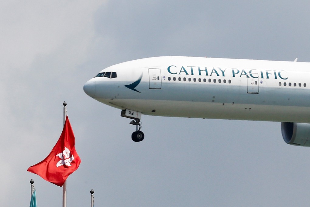 A Cathay Pacific Boeing 777-300ER lands at Hong Kong International Airport. Photo: Reuters