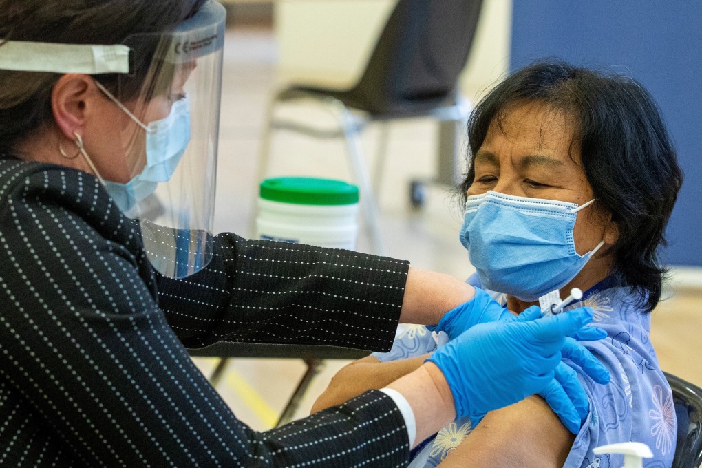 Anita Quidangen got the first dose in Ontario. Photo: Reuters