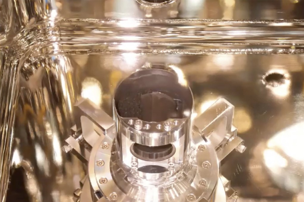 Soil samples from the asteroid Ryugu are seen inside a re-entry capsule at the Japan Aerospace Exploration Agency (JAXA) on Tuesday. Photo: JAXA via AP