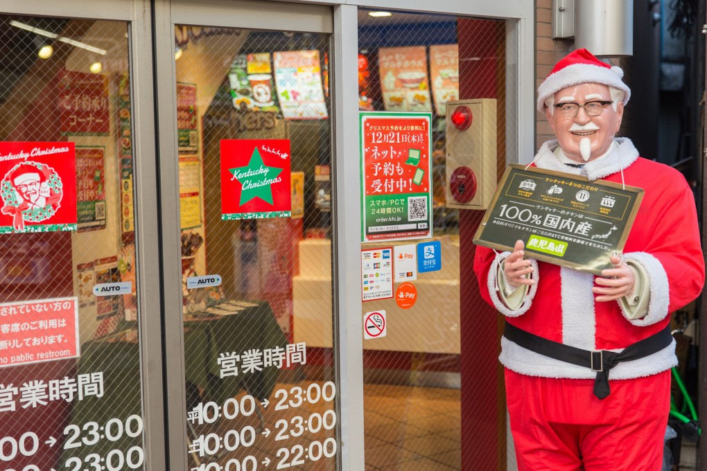 A Santa in Osaka, Japan, where Christmas is celebrated with buckets of Kentucky Fried Chicken. Photo: Shutterstock
