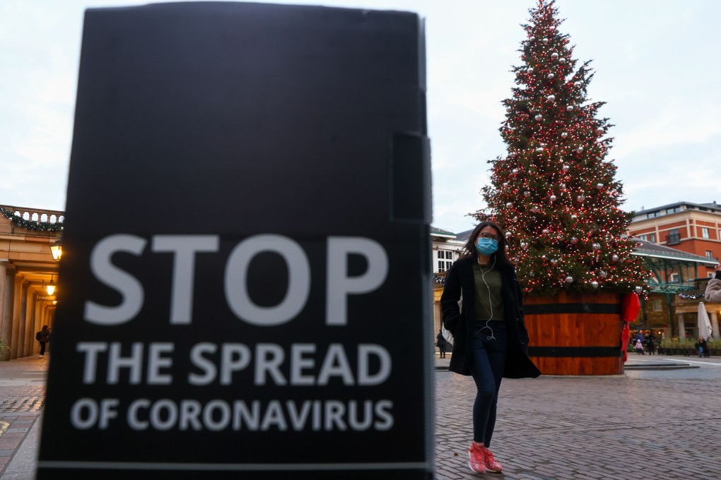 A ‘Stop the spread of coronavirus’ sign in Covent Garden in London. Photo: Bloomberg