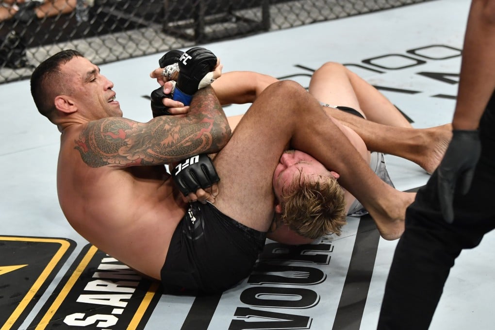 Fabricio Werdum works to secure an arm bar submission against Alexander Gustafsson in their heavyweight fight during UFC Fight Night. Photos: Jeff Bottari/Zuffa LLC