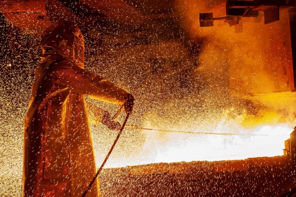 A worker mans a furnace during the nickel-smelting process at a plant in Indonesia. Photo: AFP