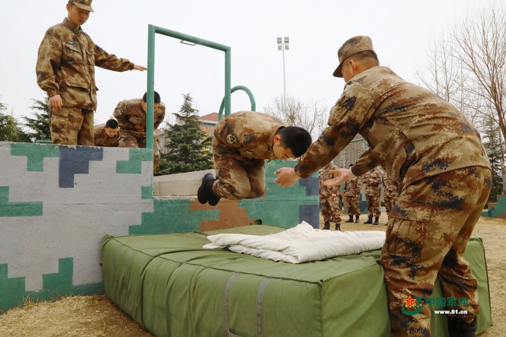 The PLA’s parachutists practise a dropping manoeuvre, but some of their training now incorporates technology. Photo: PLA Daily