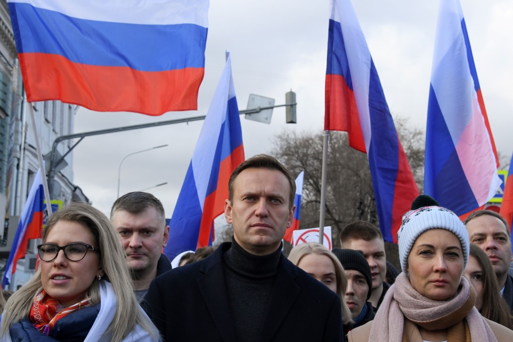 Russian opposition leader Alexei Navalny (centre) and other demonstrators take part in a march in downtown Moscow on February. Photo: AFP