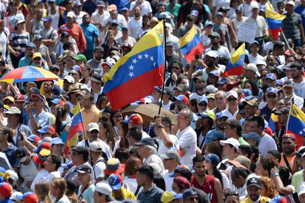 Hundreds of thousands of Venezuelans took to the streets for most of last year in a failed attempt to remove Nicolas Maduro from the presidency. Photo: AFP