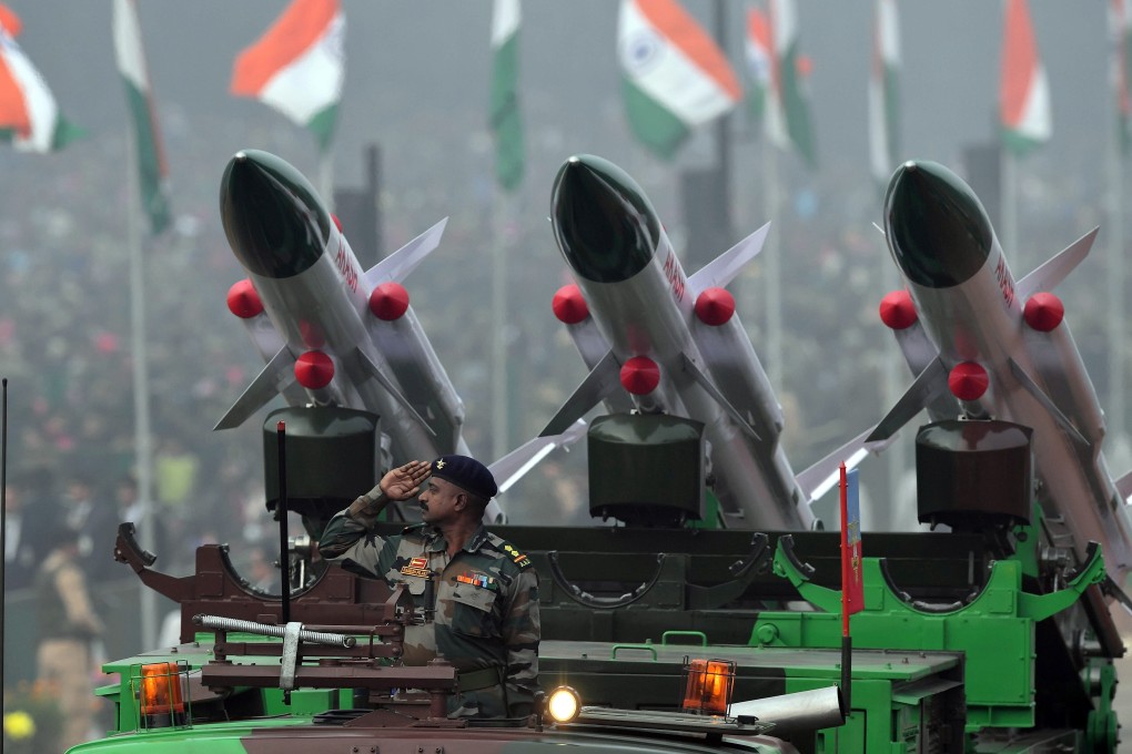 A member of the Indian army salutes from an Akash rocket launcher vehicle during the country’s 69th Republic Day parade in New Delhi on January 26, 2018. In terms of military expenditure, India ranks third in the world after the US and China. Photo: AFP
