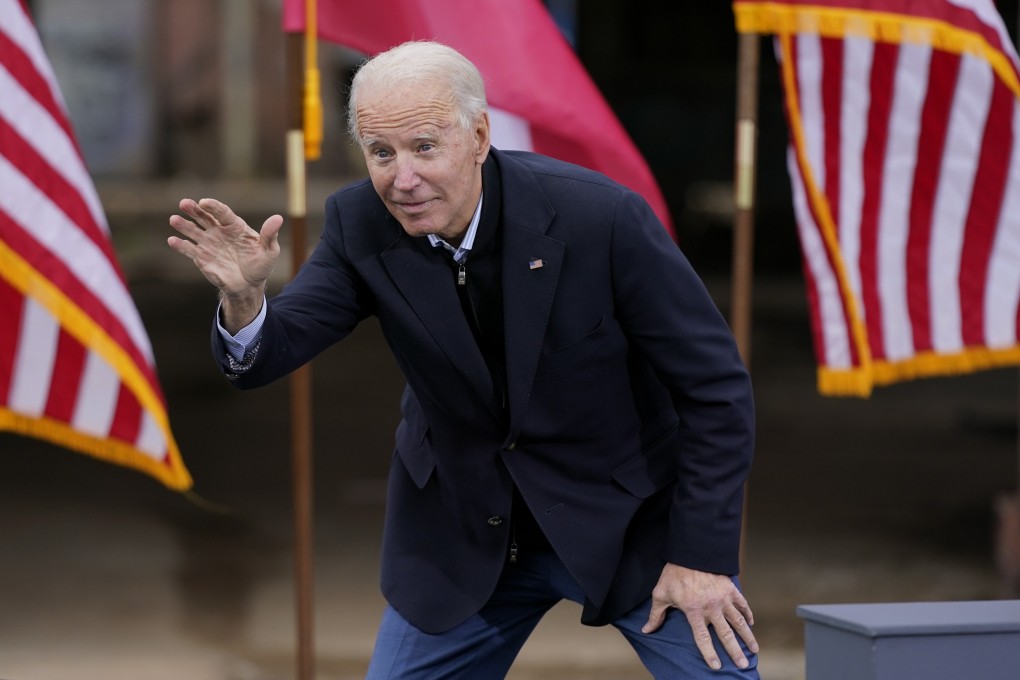 US President-elect Joe Biden waves to supporters after speaking at a drive-in rally in Atlanta for Georgia Democratic Senate candidates Raphael Warnock and Jon Ossoff. Photo: AP