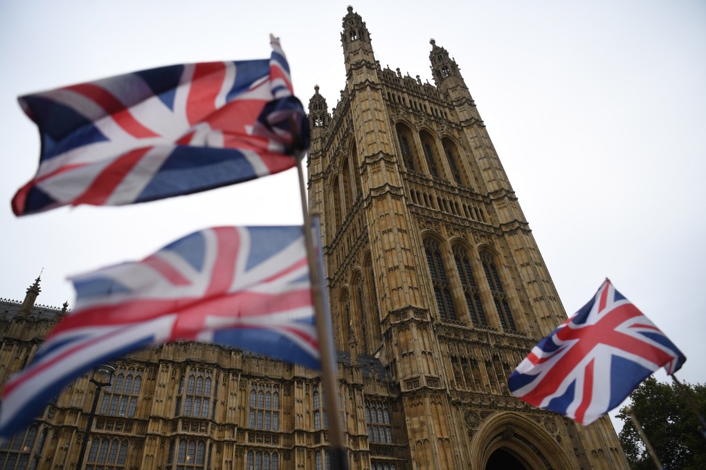 Union flags fly before the Houses of Parliament in London. A British all-party parliamentary group has been championing the rights of Hongkongers involved in last year’s anti-government protests. Photo: EPA-EFE