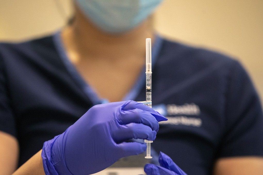 A nurse prepares an injection of the Pfizer-BioNTech COVID-19 vaccine in Westwood, California. A health worker in Alaska experienced flushes and shortness of breath after receiving the vaccine, the local Department of Health and Social Services said. Photo: Los Angeles Times via AP, Pool