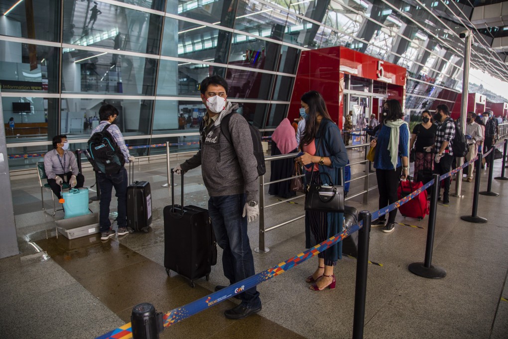 Will vaccinations become mandatory for air travel? No nation has confirmed this, but the travel industry is alarmed. Photo by Yawar Nazir/Getty Images